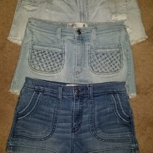 3 pairs of high rise jean shorts.
